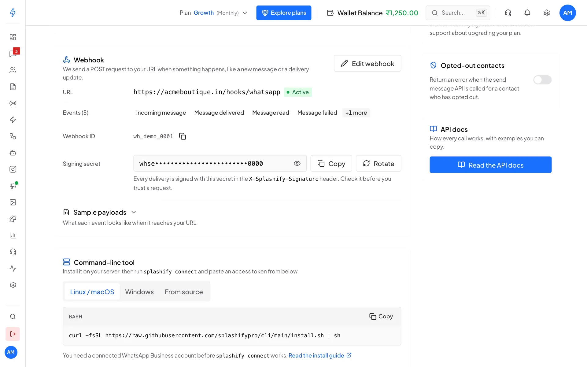 The Webhook card with the URL marked Active, five events, the webhook ID and a hidden signing secret with Copy and Rotate buttons